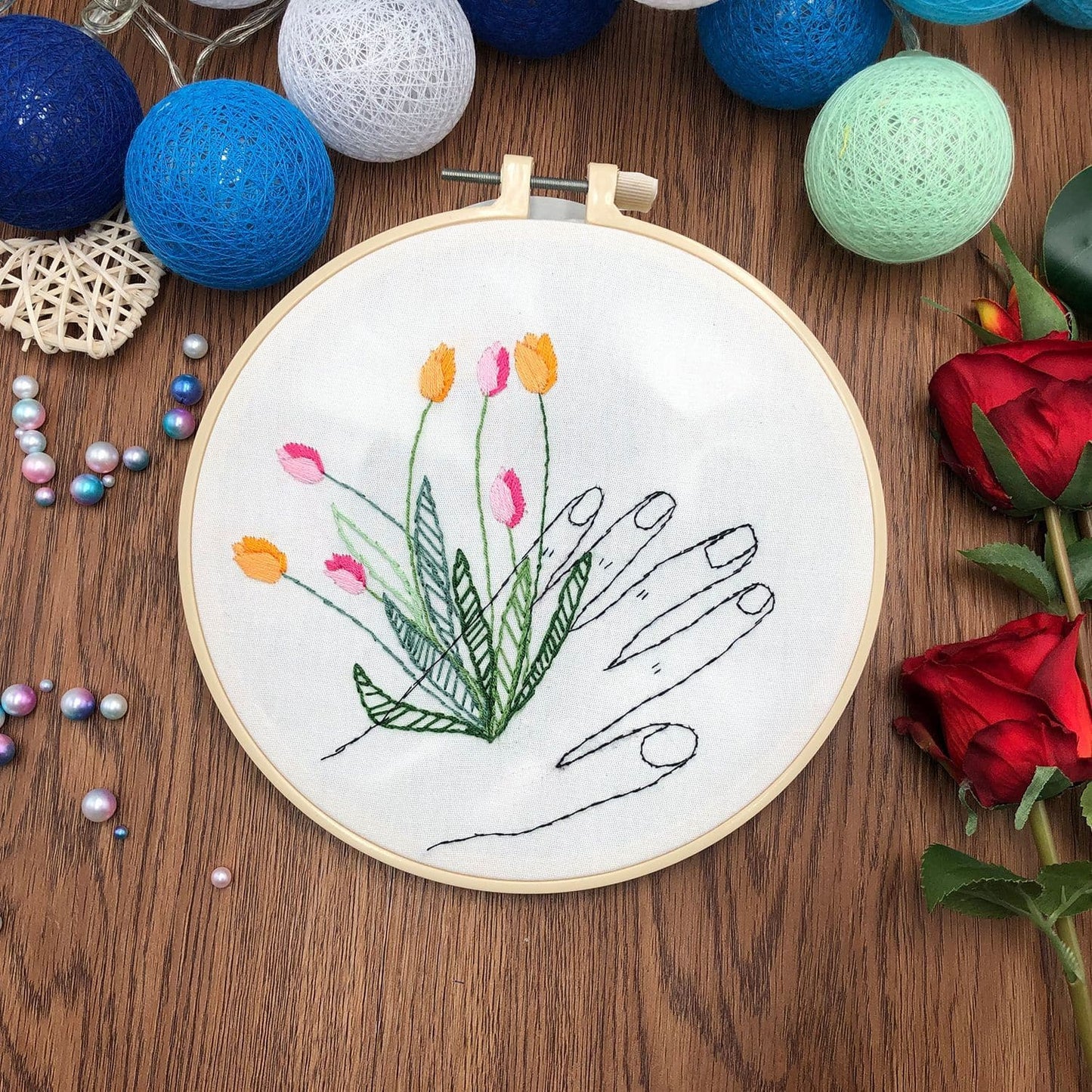 "The hand that holds the flower" - embroidery ktclubs.com